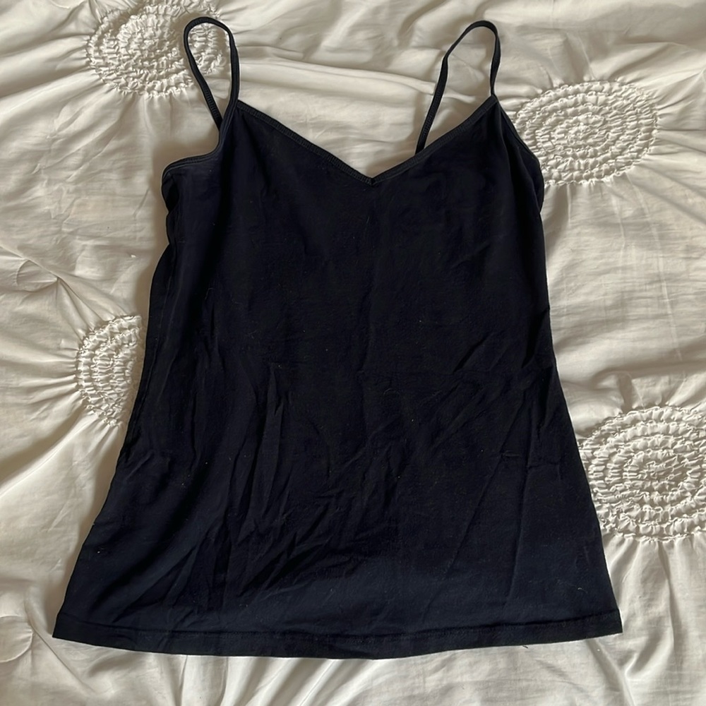 3 tank tops in navy, pale pink, and white tank tops